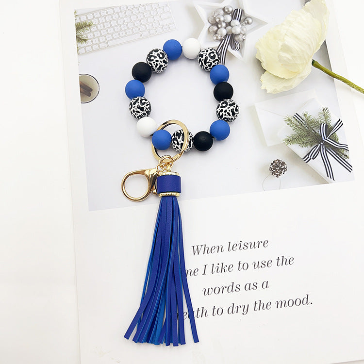 Wholesale Leopard Print White Bottom Wooden Beads Rubber Paint Round Beads PU Tassel Bracelet Keychain
